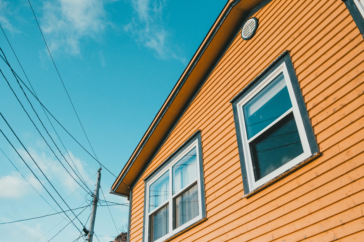 close-up of siding painted orange